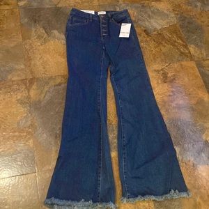 C’est Toi brand ladies mid rise flare jeans.